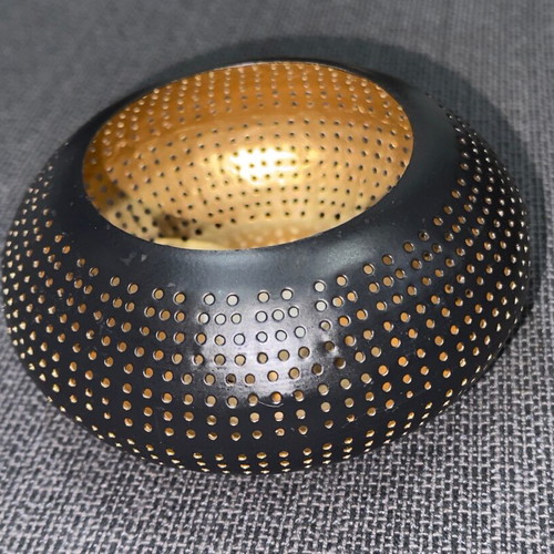Metal tealight candle holder used black-gold with perforated design