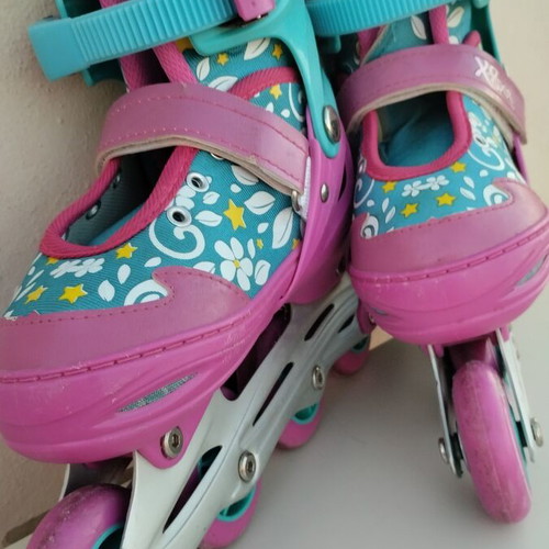 Xspot adjustable rollers size 35/37 used, turquoise pink with flowers