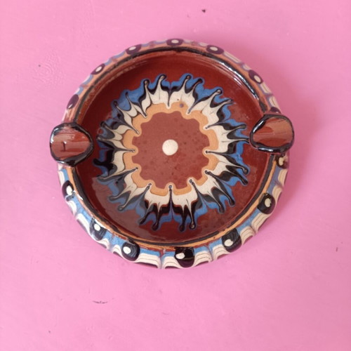 Clay ashtray folklore like new