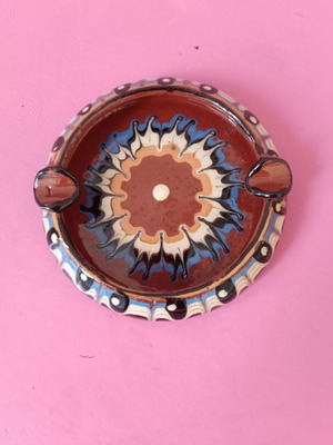 Clay ashtray folklore like new