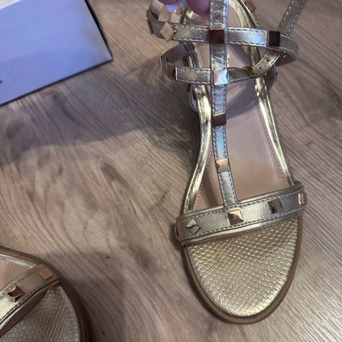 Gold sandals new with studs, size 39