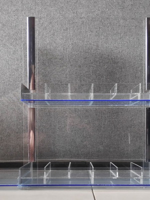 Tabletop plexiglass product display stand like new with metal decorations