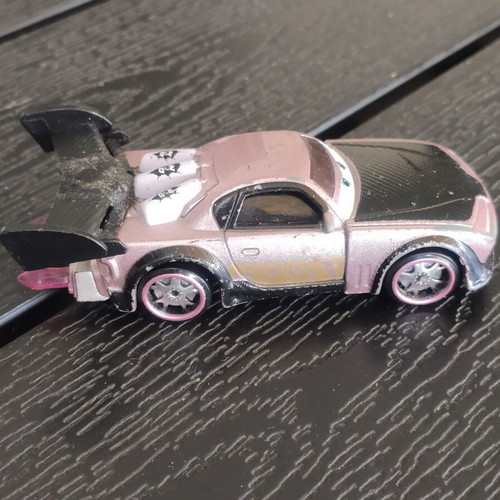 Disney Cars Boost 1:55 scale used with glued spoiler and bent wheels