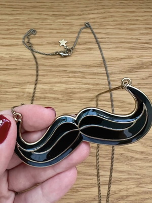 Accessorize long necklace with mustache design like new, black