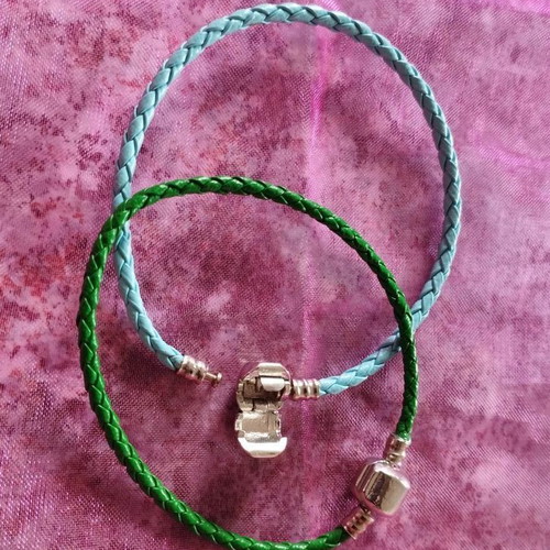 Leatherette bracelets new, 1 blue and 1 green