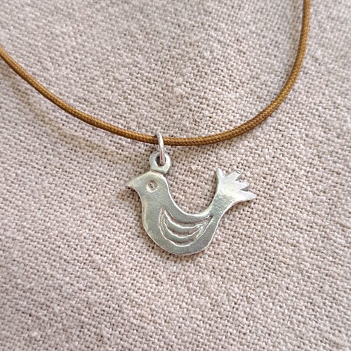 Vally Kontidis Silver Bird Necklace on Ecru Cord like new