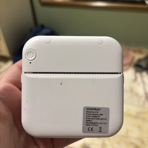 Mini printer like new with 6 rolls, cable and box