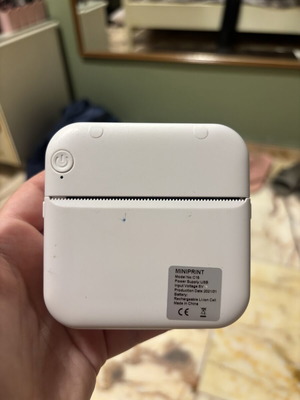 Mini printer like new with 6 rolls, cable and box