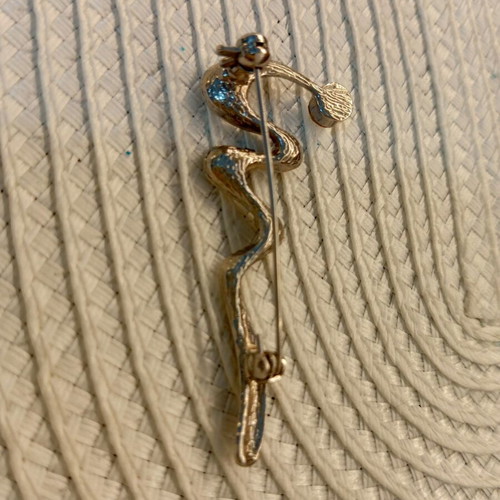 Oriflame brooch like new, silver snake design with crystal