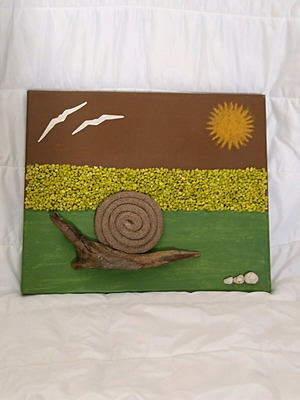 Handmade canvas art with snail and decorative stones