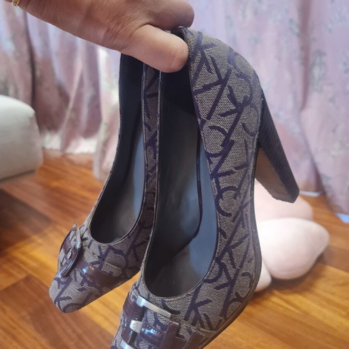 Calvin Klein burgundy high heels used with unique design