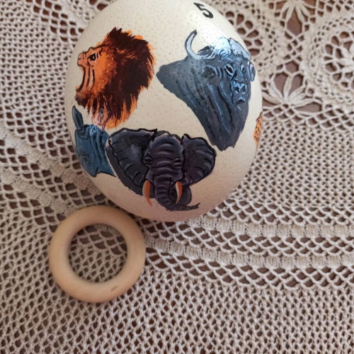 Ostrich egg painted like new with stand and painted animals