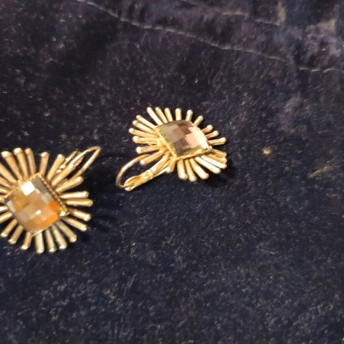 Earrings used, silver color