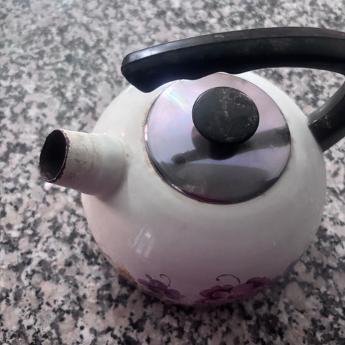 Villeroy and Boch enamel teapot used with floral design