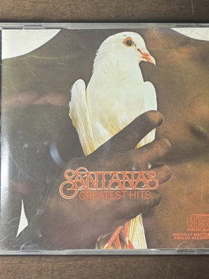 Santana's Greatest Hits CD like new, Latin genre compilation