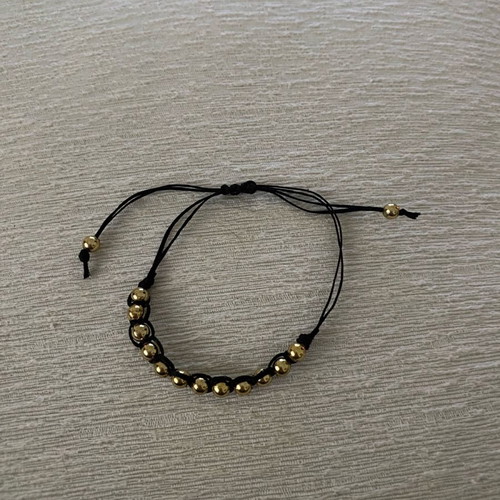 Handmade bracelet with gold details