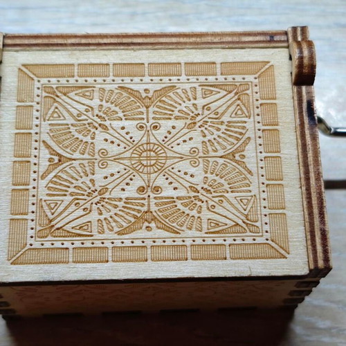 Wooden Queen Music Box like new with hand crank and engraved design