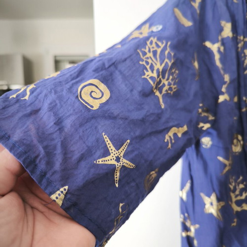 Women's blue shirt with gold designs, 3/4 sleeves, adjustable