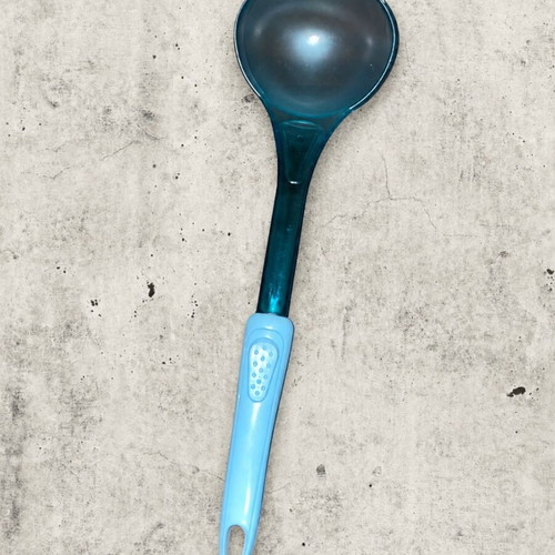 Blue serving ladle with ergonomic handle
