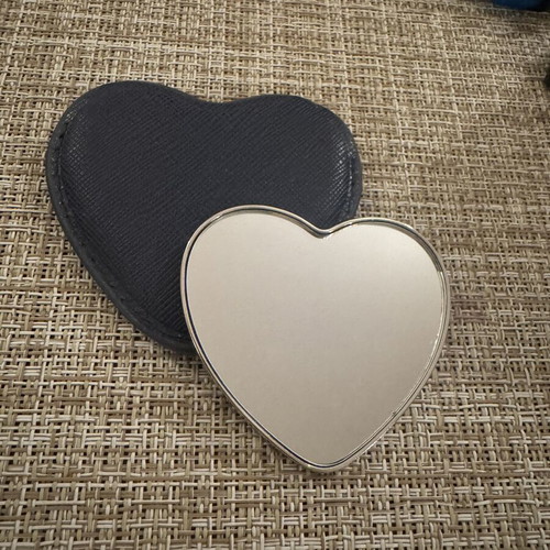Oliver Weber Collection heart-shaped compact mirror with case