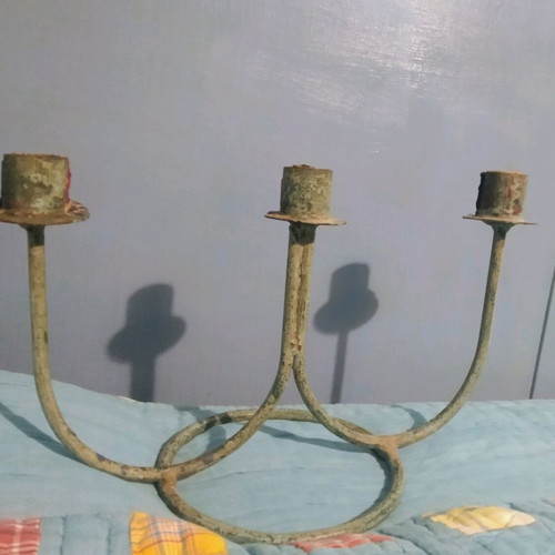 Vintage three-arm candlestick made of patinated brass like new