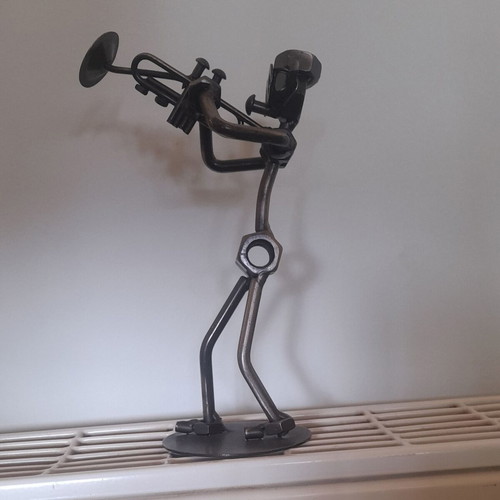 Metal decorative musician statue with trumpet like new, industrial style 19cm
