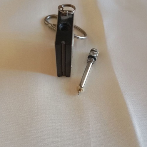 Vintage biker legend keychain lighter like new, nickel color