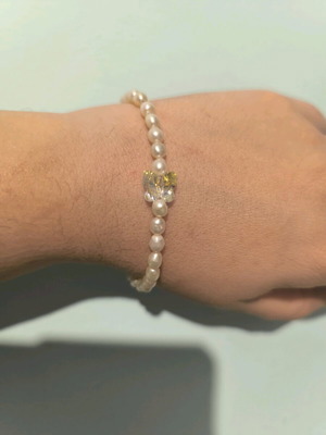Bracelet with butterfly and pearls used