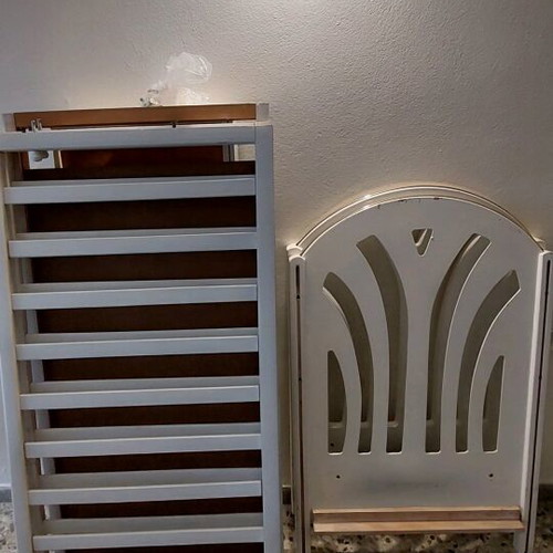 Baby cot used with mattress and storage space