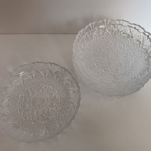 Set of 5 glass plates with embossed designs like new