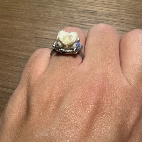 Adjustable ring with white rose design like new