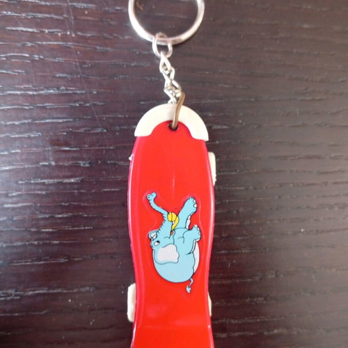 Mini skateboard keychain used with blue elephant design