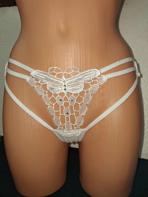 Women's white string panties with butterfly lace design