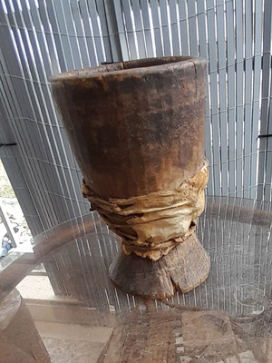 Wooden container used with leather, carved from Africa