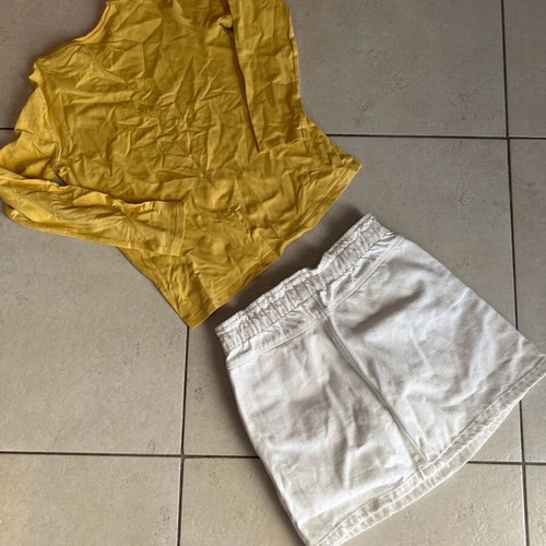 Set white skirt and yellow unicorn blouse used, size 10