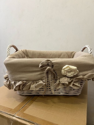 Wicker basket new with linen fabric lining and handmade knitted flower