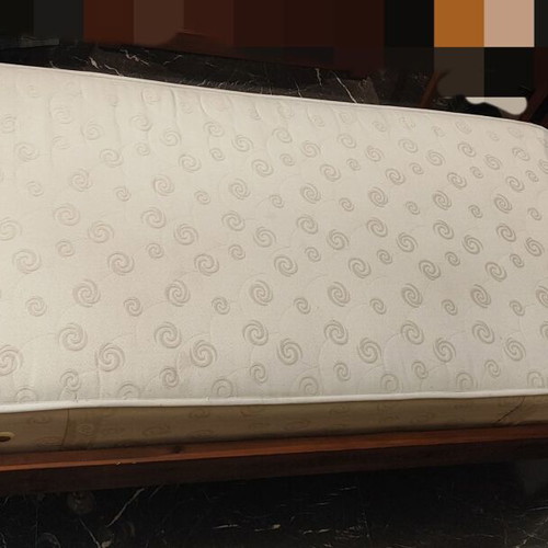 Solid wood single bed with clean mattress