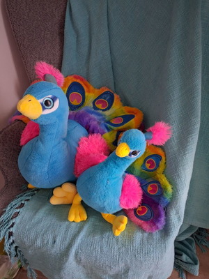 Plush peacocks used in good condition