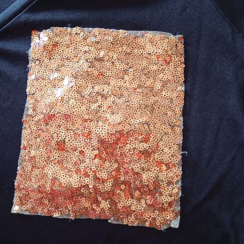 Black elastic blouse with sequin pocket and cutout, like new