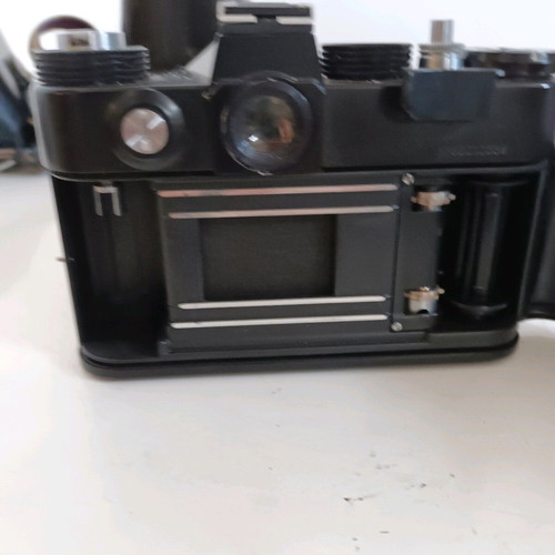 Zenit EM camera used with Helios 44M 2/58 lens and leather case