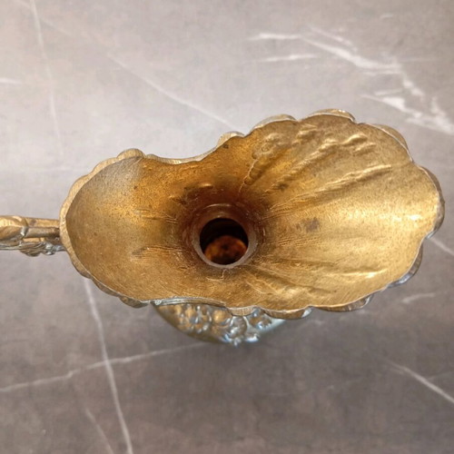 Metal container used with embossed design and handle
