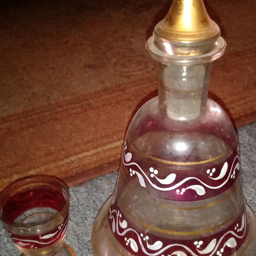 Liqueur bottle used 20 cm with gilded cap and small glass