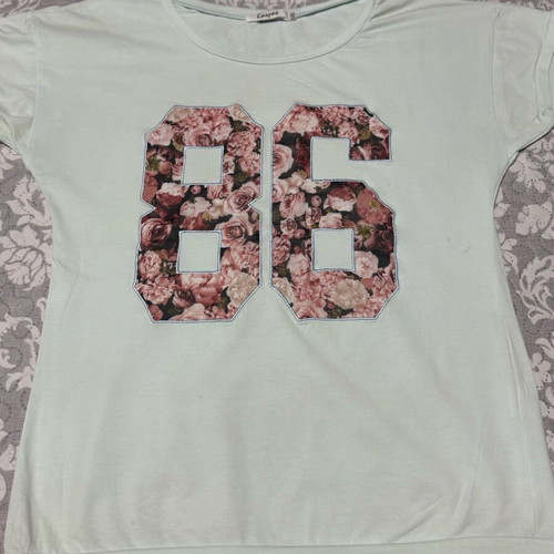T-shirt in blue color with flowers like new, size L/Xl