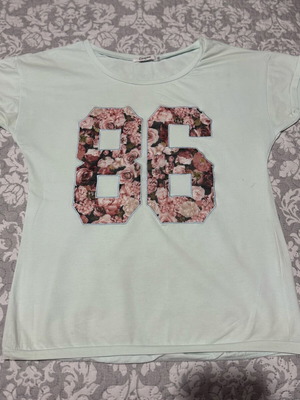 T-shirt in blue color with flowers like new, size L/Xl