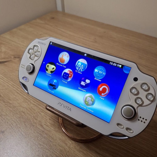Sony PlayStation Vita 1000 OLED White like new with 8GB card and charging cable