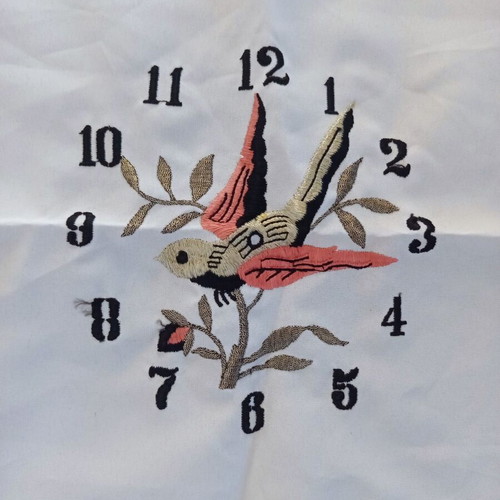 Vintage machine embroidery clock with bird on beige fabric new