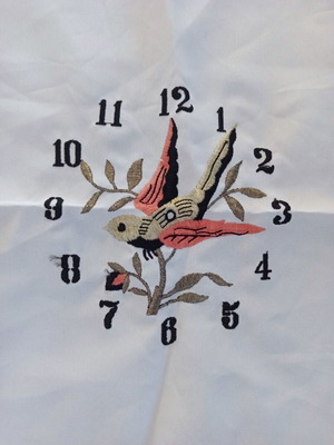 Vintage machine embroidery clock with bird on beige fabric new