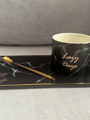 Cup with saucer and spoon like new, modern ceramic style