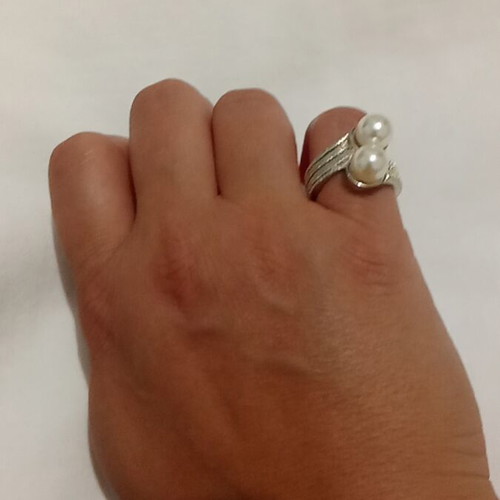 Metal ring with plastic pearls like new, gold color