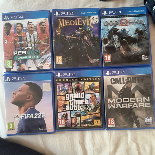 PlayStation 4 Slim 1TB used with 6 games and 2 controllers